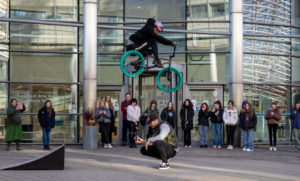 Kriss Kyle does a BMX trick outside the Northumbria University School of Design for a cycle-inspired masterclass.